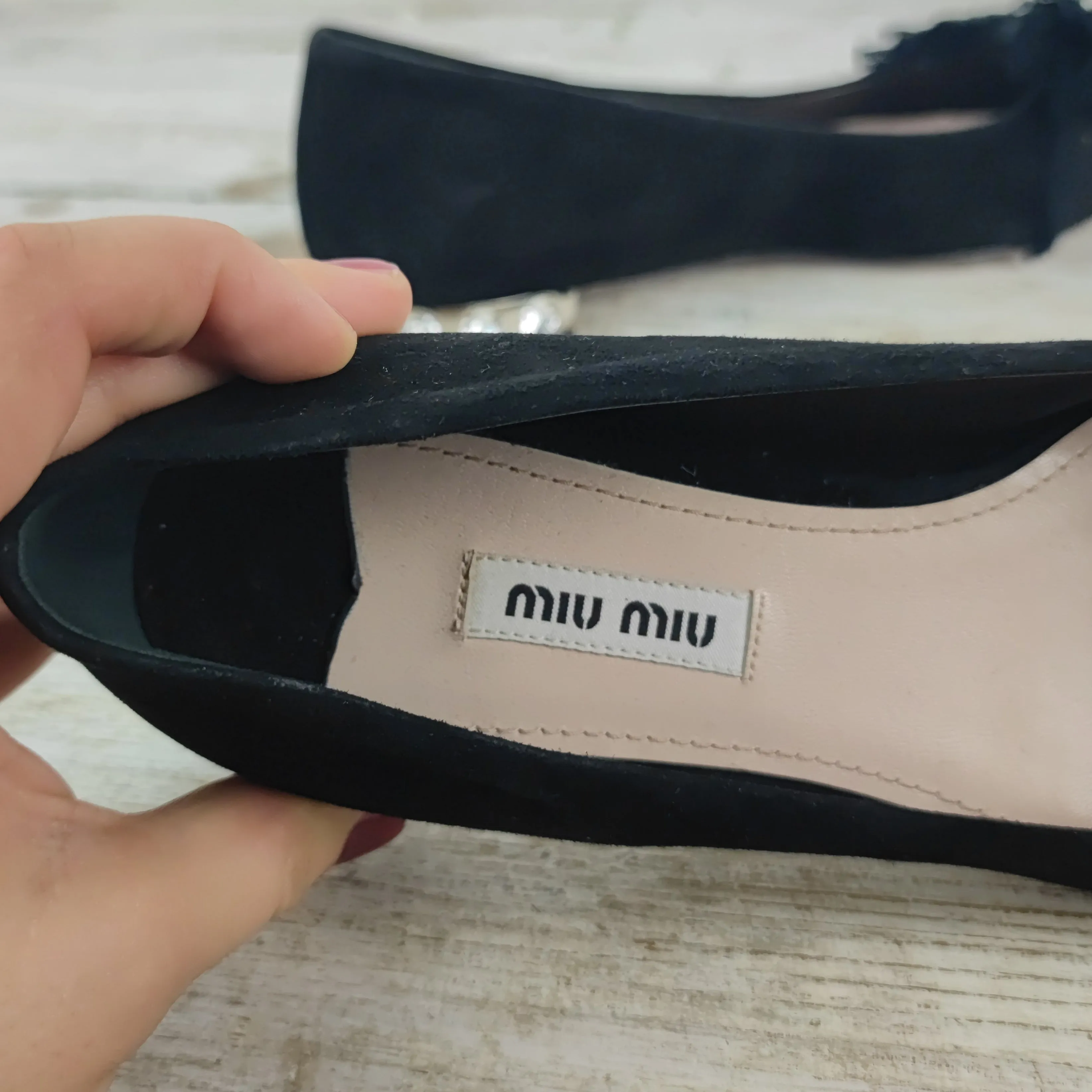 Ballerine Miu Miu con fiocco e tacco gioiello